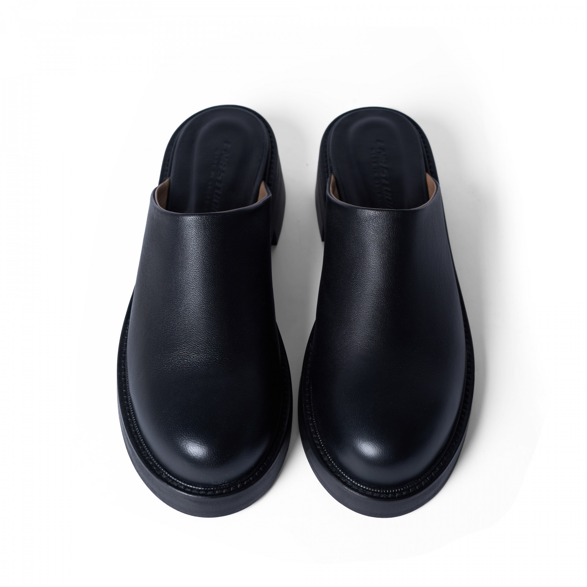 Mules with flat soles Mules with flat soles