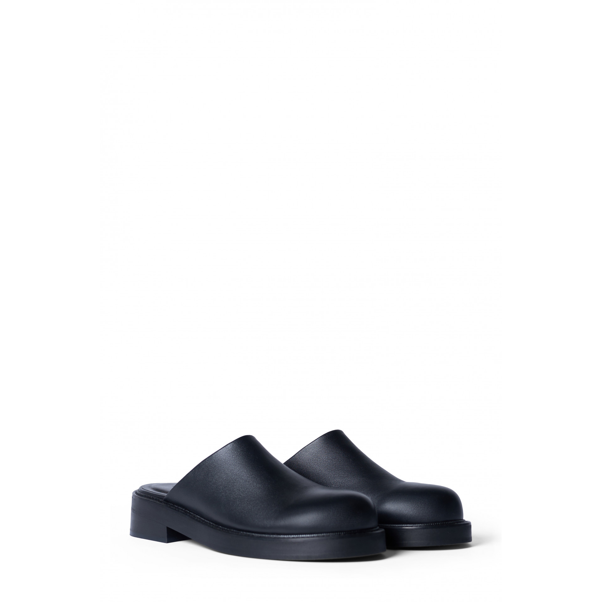 Mules with flat soles Mules with flat soles